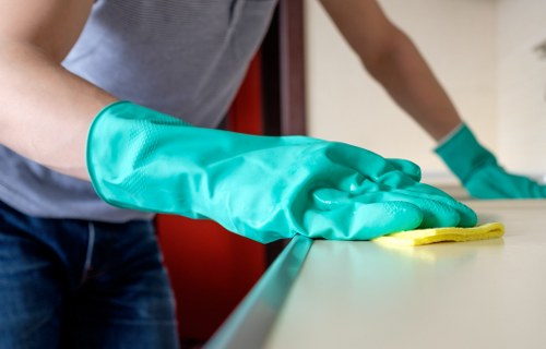 Deep cleaning a living room chair during upholstery cleaning in Tulse Hill